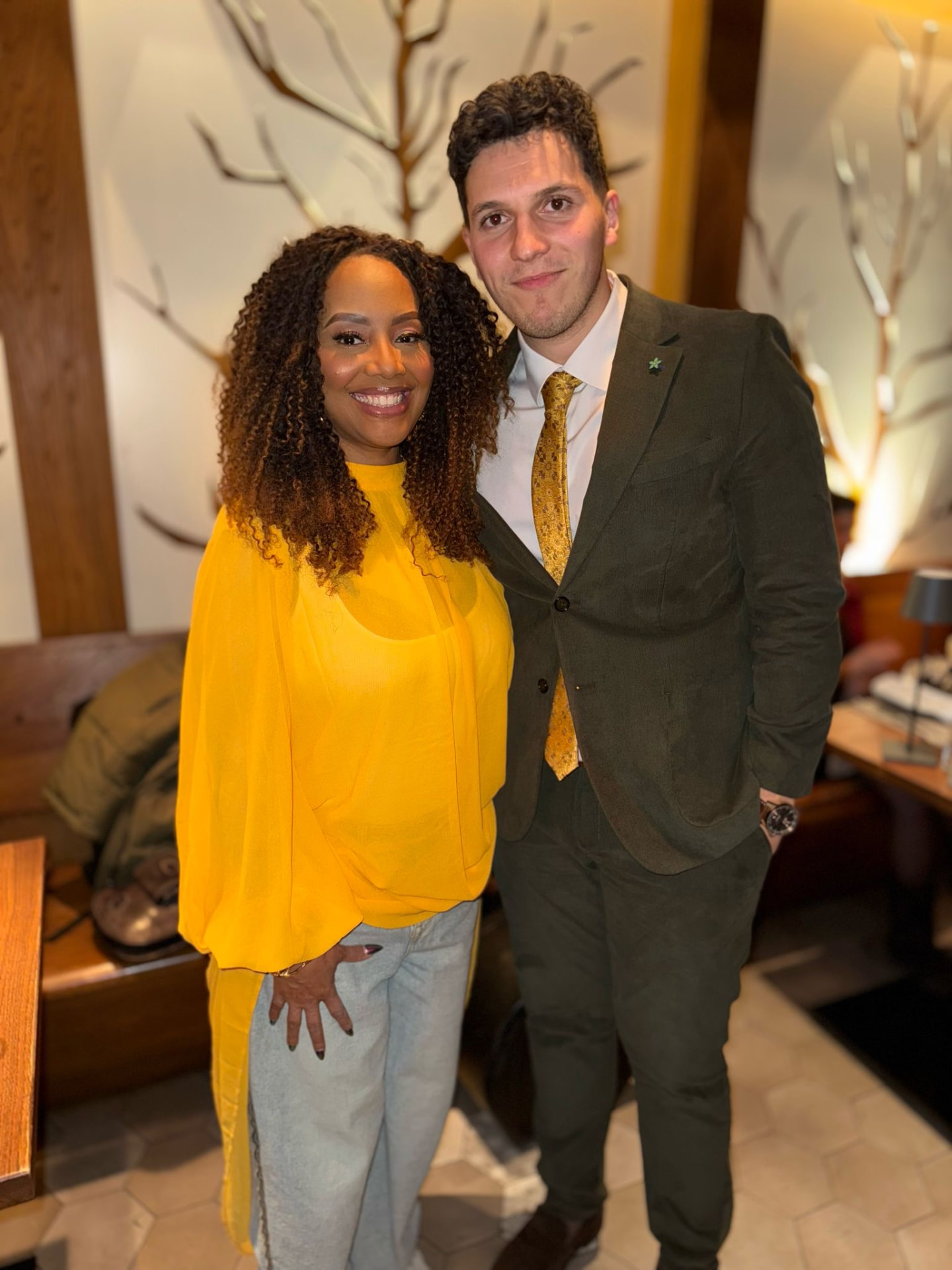 ILIJA in a green suit with vocalist Lalah Hathaway backstage